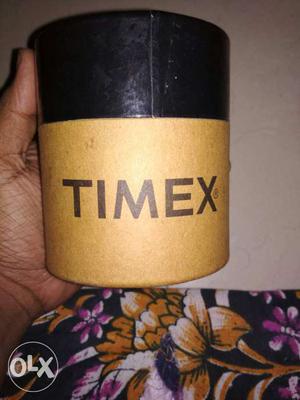 Black And Brown Timex Bottle