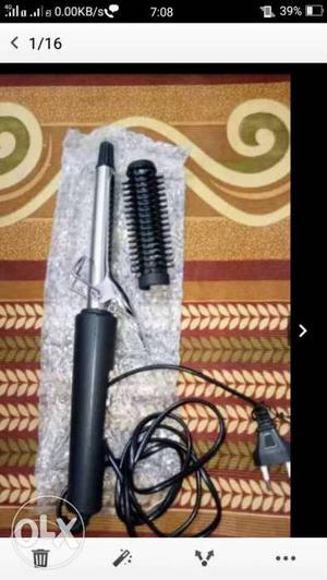 Black And Stainless Steel Hair Curling Iron Screenshot