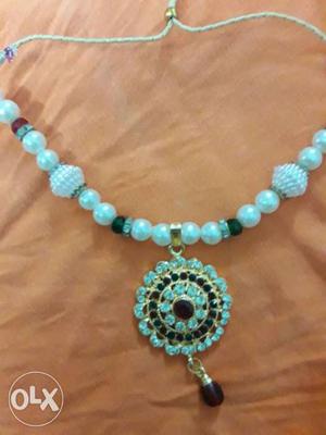Blue And Beige Beaded Pendant Necklace