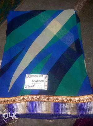 Blue, Green, And Black Textile
