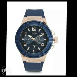 Blue and rose gold dial with blue silicone strap