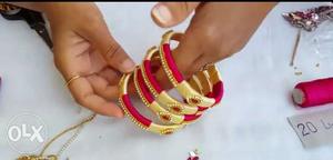 Four Gold And Red Silk Thread Bangles