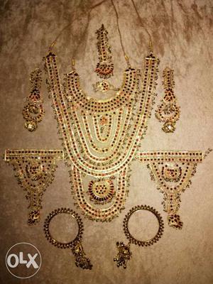 Gold And Red Gemstone Embellished Bib Necklace
