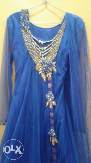 Heavy anarkali suit net fabric with stone work