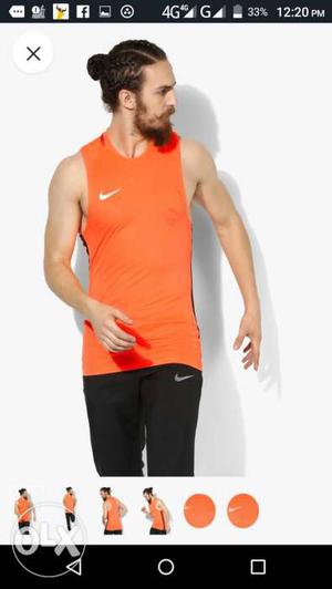 Men's Orange Nike Tank Top And Black Nike Bottoms