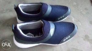 Pair Of Blue Slip-on Shoes