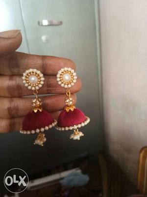 Pair Of Gold-and-red Earrings
