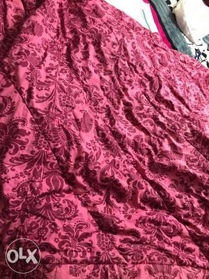 Pink And Red Floral Textile