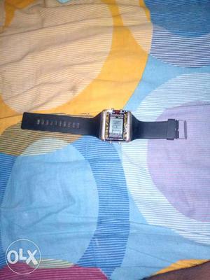 Rectangular Silver Digital Watch With Black Rubber Strap