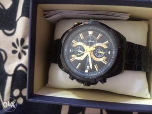 Round Black And Gold Chronograph Watch With Box