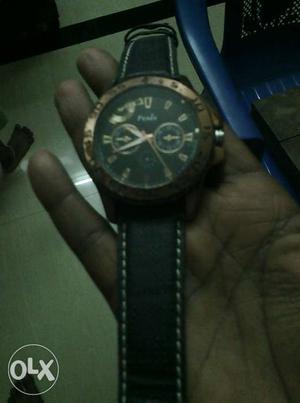 Round Brown Chronograph Watch With Black Leather Strap