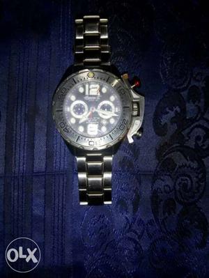 Round Silver Frame Chronograph Watch With Silver Link Strap