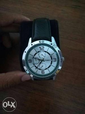 Round Silver Timex Chronograph Watch With Black Strap
