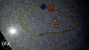 Two Blue And Orange Beaded Pendant Floral Themed Necklaces