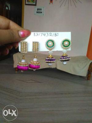Two Pairs Of Pink And Purple Jhumka Earrings