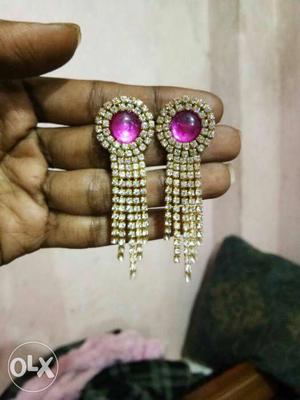 Two Pink Gemstone Embedded Gold Earrings
