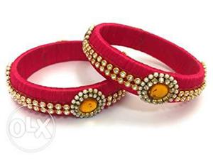 Two Red And Brown Thread Bracelets