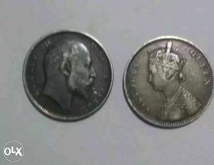 Two Round Silver Coins\
