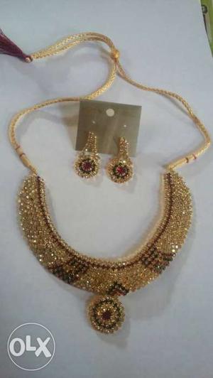 Two unused beautiful neclace set with earings,