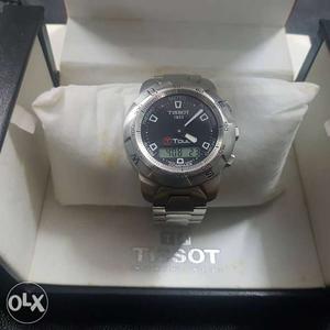 Unused Tissot T touch with box and papers dealers
