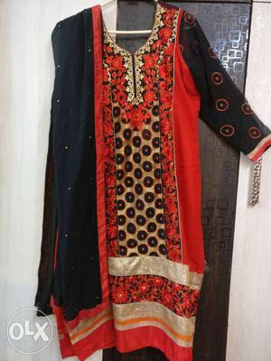Very graceful party wear suit with work on front