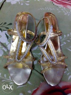 Women's Pair Of Silver And Gold Flat Sandals