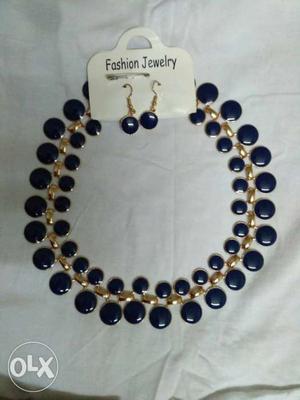 Blue Gemstone Gold Bib Necklace And Drop Earrings
