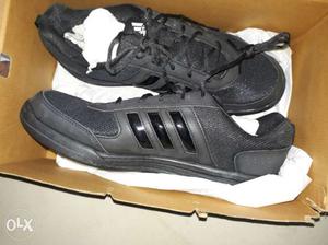 Brand new Pair Of Black Adidas sports shoe!