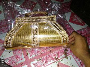 New purse in golden colour