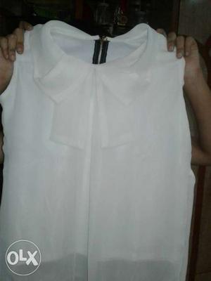 Only 1 tym wear all off white bow sleeveless top