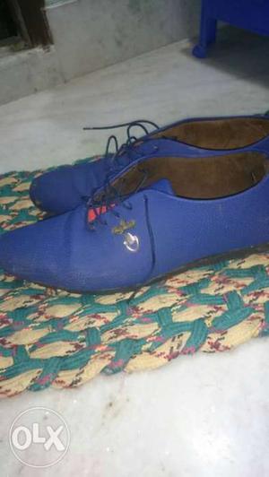 Pair Of Blue Sweat Leather Dress Shoes