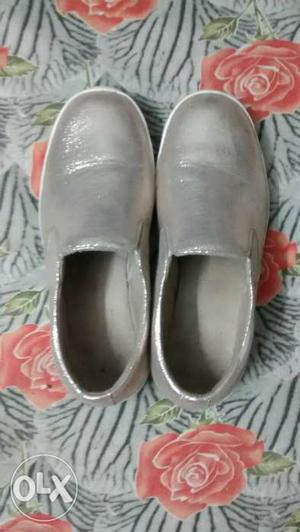Pair Of Gray Leather Loafer Shoes