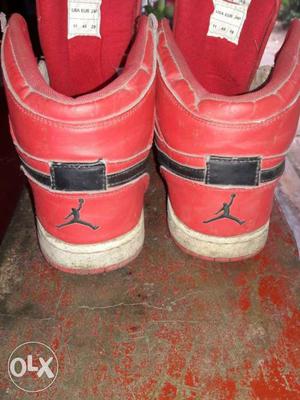 Pair Of Red Air Jordan Basketball Shoes