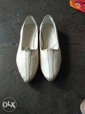 Pair Of White Leather Loafers