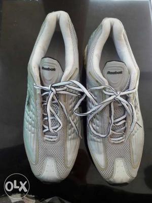 Pair Of White Reebok Running Shoes