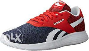 Paired Red And Black Reebok Running Shoe