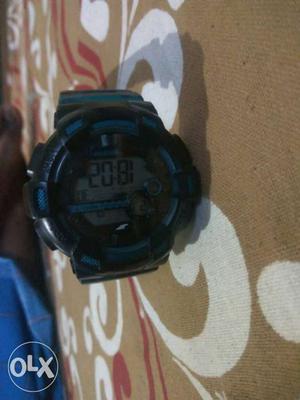 Round Digital Watch With Black Strap