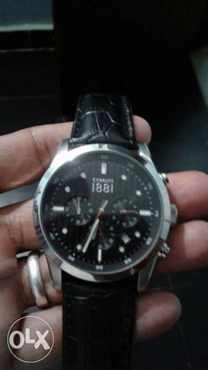 Round Silver And Black Chronograph Watch With Black Leather