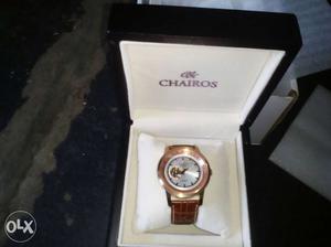 Round Silver And Gold Chairos Chronograph Watch With Case