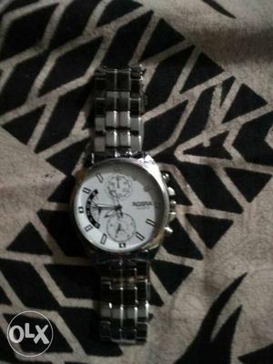 Round Silver Chronograph Watch With Link Bad