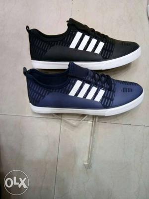 Two Black And Blue Low Top Shoes