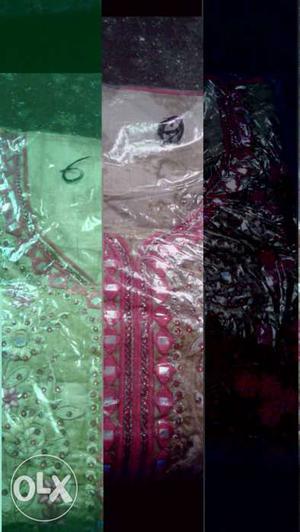 Two Green And Pink Kameez In Packages