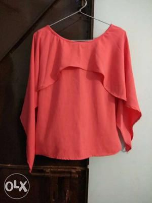 Urgent sale.peach colour stylish unused top available at