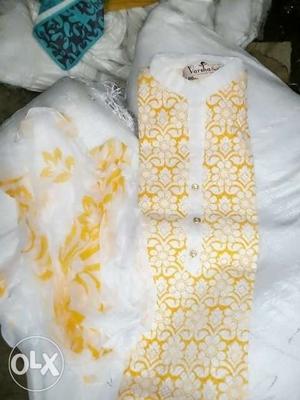 Yellow And White Floral Traditional Dress packed suit
