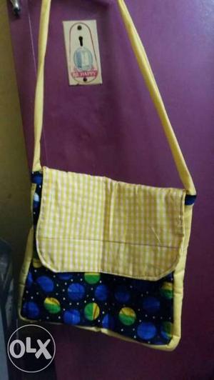 Yellow, Blue, And Black Circle Print Crossbody Bag