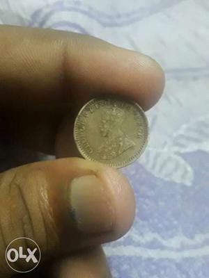 1oo year. old coin of half anna
