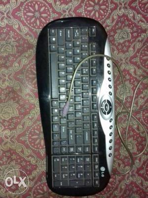 Black And Silver LG Corded Computer Keyboard