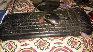 Black Corded Computer Keyboard And Corded Computer Mouse