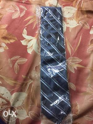 Blue And White Striped Necktie