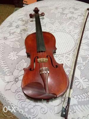 Brown And Black Violin Set